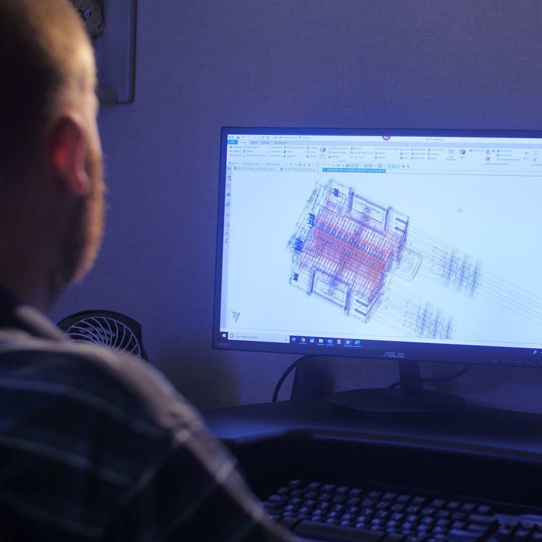 Man looking at CAD software